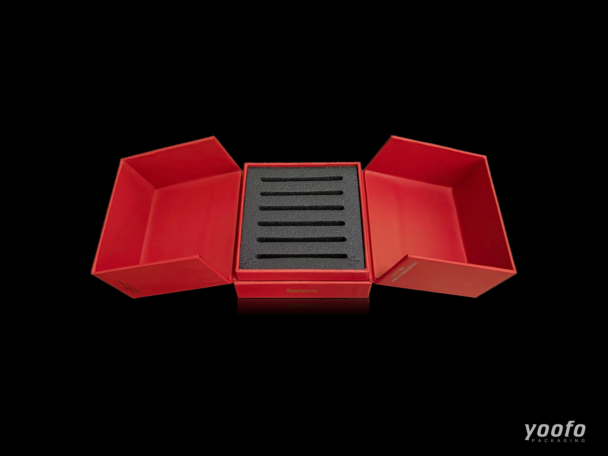 Top view of an open red gate-fold cosmetic box with red inner trays and a six-slot black EVA foam insert